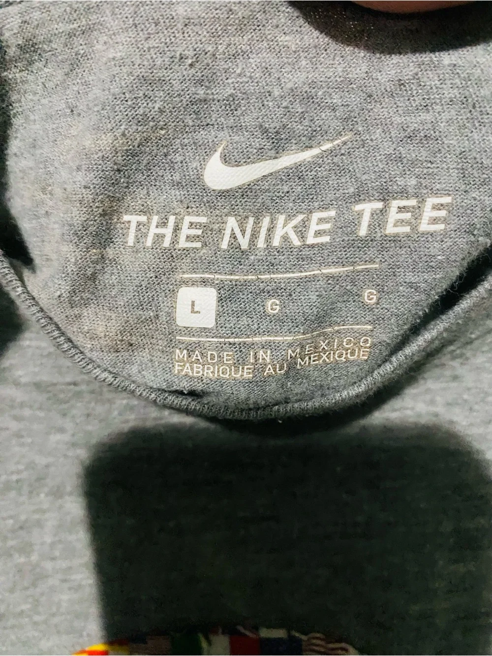 Nike Gray Short-Sleeve Tee with Gold Swoosh and Multicolor Flag Ring